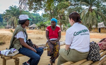 Irene Togbah talks to Concern staff. 