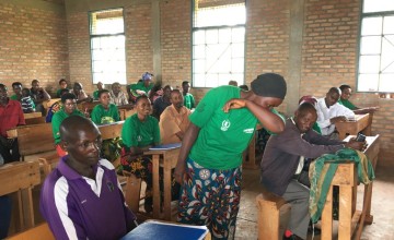 Demonstration of the COVID-19 barrier gestures, by the Care group volunteer during a training session on key information on risk communication and prevention, Kirundo, Burundi. Photo taken in May 2020, by Supervisor Anatole Mirenzo, Concern Burundi.