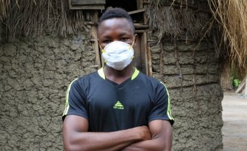 Daddy Mansaray wearing a mask as a preventative measure against Covid-19, Sierra Leone. Photo: Mohamed Saidu Bah 