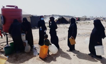 Providing clean water and promoting COVID-19 awareness in a camp in northern Syria. Photo: Concern Worldwide