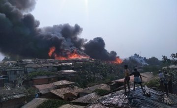 View from nearby homes of a fire in Cox's Bazaar in March 2021