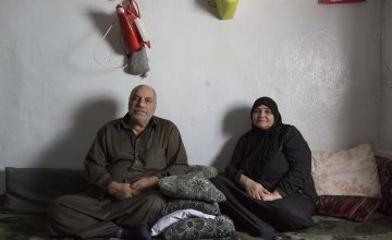 Khaled and Fatima, Syrian refugees, in their home in Lebanon