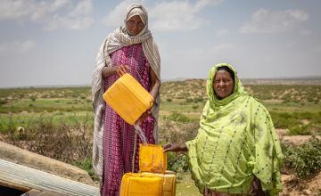 Water being drawn from an underground rain water tank in Somaliland.