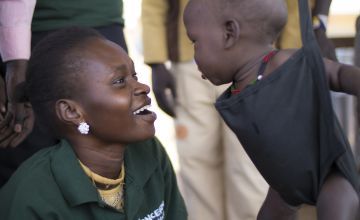 A young boy receives a medical exam in South Sudan