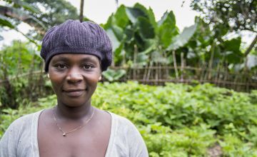 Liberian farmer on her plot of land