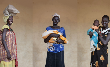Three South Sudanese women with their young children
