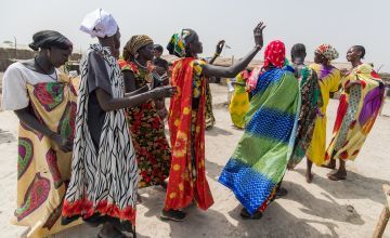 Mothers group in South Sudan dancing and singing