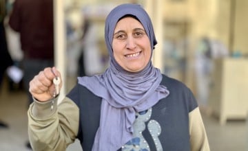 Syrian woman holding her keys