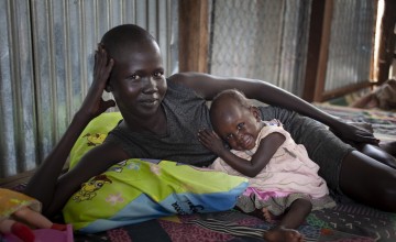 South Sudanese mother and her daughter in a protection of civilians site