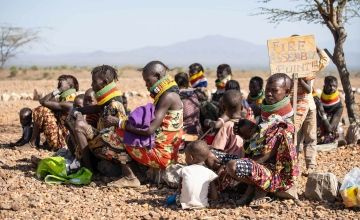 Women wait for their children to receive treatment for malnutrition.