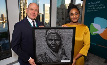 Concern Worldwide Haiti Programme Director, Victoria Jean-Louis, presents a photographic art piece which incorporates over 10,000 signatures for Concern’s Nothing Kills Like Hunger campaign to the Permanent Representative of Ireland to the United Nations, Fergal Mythen,.