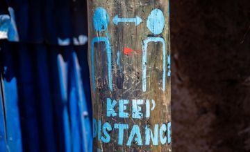 'Keep Distancing' street art in Kibera Slum, Nairobi, Kenya 