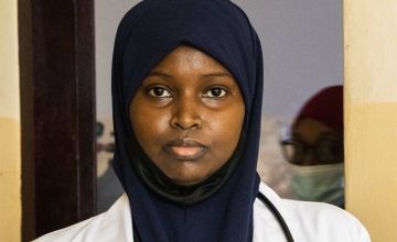 Female doctor in navy head scarf