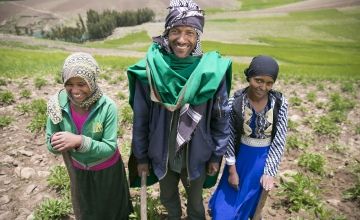 Ethiopian farmer with his family in the highlands of South Wollo