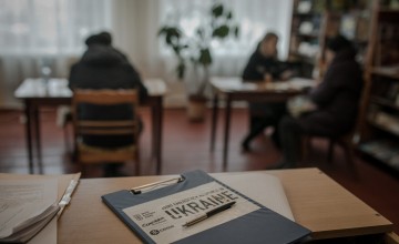 People wait to be verified so that they can receive a cash transfer from the JERU programme in Ukraine. Photo: Simona Supino/Concern Worldwide