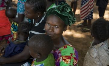 Pregnant mothers and children attend a bimonthly mobile maternal and childhood health unit in the village of Gbawi, CAR