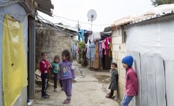 Children in Lebanese alleyway, with clothes hanging on line