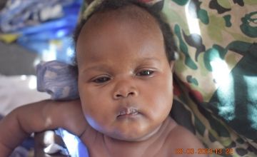 Baby Nyaguande, who was born in South Sudan
