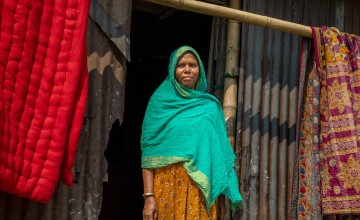 Malika Begum is a programme participant of the Zurich programme. She benefitted hugely from the CSA aspect and learned to grown vegetables, even when there is flooding. She grows them on raised platforms. Photo: Gavin Douglas/ Concern Worldwide