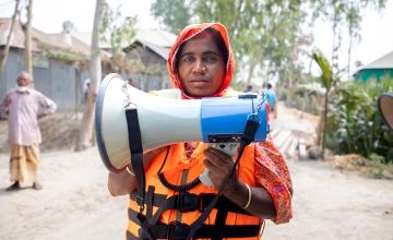 The self-help group operate an early warning system for flooding, with megaphones supplied by Concern Worldwide. Gavin Douglas / Concern Worldwide