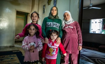 Maria* (32) her husband and four children live in a small apartment in Tripoli, Akkar. Described as one of the poorest areas in Tripoli, the apartment block is in disrepair. Before Concern's intervention, there were panes of glass missing, and the locks on the windows were broken allowing the wind to blow them open at any moment. Photo: Gavin Douglas/Concern Worldwide