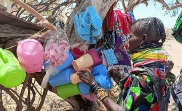 Rebecca Akai Ewoi working at her shop in Kalopeta