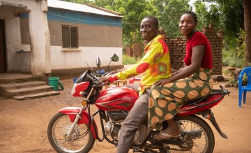 Graduation participants started a motorcycle taxi business as part of the programme. Photo: Chris Gagnon/Concern Worldwide.