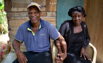 Jaques Delouis with his wife Rosmaine at their rented home on the plantation where he works in the Centre department of Haiti. Photo: Kieran McConville/Concern Worldwide