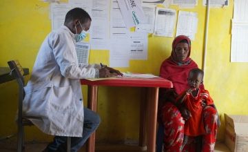 Muad Najib Khalif (4) and his mother Bishaaro Abdulahi Omar attend a malnutrition screening visit at the local health centre in Legahida, Ethiopia. Photo: Conor O'Donovan/Concern Worldwide