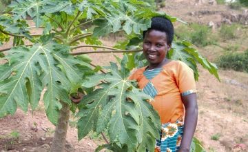Marie-Claire Ayinkamiye in her plot of land in Rwanda