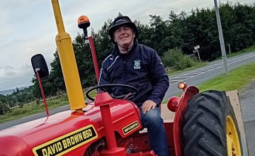 Pat Murphy in his 1962 David Brown 850, which he is driving along the 2,800km Wild Atlantic Way at top speed of 24kph to raise money for Concern and Gaza.