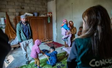 Khaled* lives in the mountains of Lebanon with his wife Maram* and four children. He worked for a farmer in exchange for land to put his tent. The freezing cold temperatures have forced his family to rent a house in the town for the winter which they cannot afford. (Photo: Gavin Douglas/Concern Worldwide)