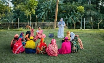 Youth leader Sumaiya Akter Jui holds a meeting with female villagers about water purification, as part of the Concern-led CRAAIN programme in Bangladesh. (Photo: Mohammad Rakibul Hasan/Concern Worldwide)