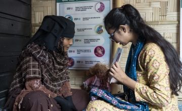 Hasina* (26) a Rohingya mother-to-be, speaks with an antenatal counselor at Camp 19 in Cox's Bazar. Language barriers can be an issue even in this area of southern Bangladesh, where many assume that the local dialect of Chittagonian is similar enough to Rohingya to be understood. (Photo: Saikat Mojumder/Concern Worldwide)