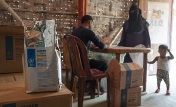 A Rohingya mother receives super cereal in the Concern nutrition centre at Camp 19, Ukhiya, Cox's Bazar. (Photo: Saikat Mojumder/Concern Worldwide)