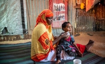 Calaso* (37) is a mother of five children. Calaso and her family moved to the refugee camp due to recurring droughts. She brought her child to the MCH (Maternal & Baby Health Center) in Siinkadheer after her child became malnourished. (Photo: Mustafa Saeed/Concern Worldwide)