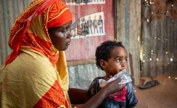 Calaso* (37) is a mother of five children. Calaso and her family moved to the refugee camp due to recurring droughts. She brought her child to the MCH (Maternal & Baby Health Center) in Siinkadheer after her child became malnourished. (Photo: Mustafa Saeed/Concern Worldwide)