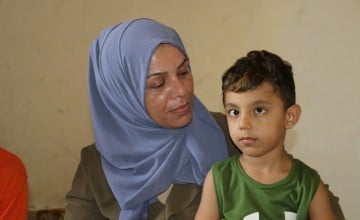 Fatima and one of her children. Photo: Omar Daouk/Concern Worldwide