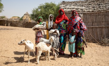 Salmata with her children and their family's latest addition: a small herd of goats, delivered as part of Concern's Chronic Humanitarian Crisis programme. Photo: Eugene Ikua/Concern Worldwide