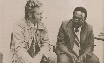 Fr. Jack Finucane discusses the drought in Ethiopia with the country's Chief Commissioner for Relief and Rehabilitation, Ato Shimelis Adugna, 1974