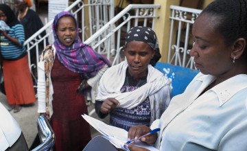 Hibret Tesemma, 38, helps distribute free clothing to HIV positive women in Addis Ababa, at the Mekdim Association, an Ethiopian NGO opened in 1997 and supported by Concern Worldwide from 2001 to 2013. (Photo: Cheney Orr/Concern Worldwide)