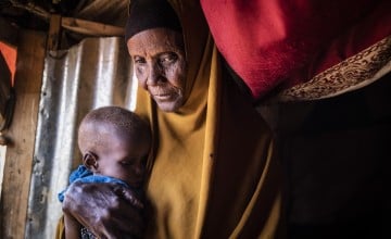 Samiro (58) and Calaso (3) in the Wadajir zone of the IDP settlement on the outskirts of Baidoa