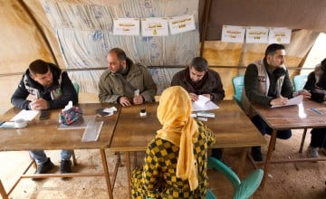 Members of the Syria Relief team deliver the cash vouchers to people affected by the February 2023 earthquake. (Photo: Ali Haj Suleiman/DEC/Fairpicture)