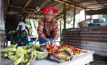 Favor B Tarr, with some of the produce from her vegetable farm at Kaytor Town, Grand Bassa, Liberia. The community is being supported by Concern in an integrated programme called IFANCI, funded by the LDSCC. (Photo: Kieran McConville/Concern Worldwide)