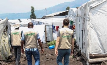 Concern DRC staff visit a displacement site in Goma, North Kivu, where Concern provides drinking water to over 230,000 people each day. Photo: Samuel Isenge/Concern Worldwide