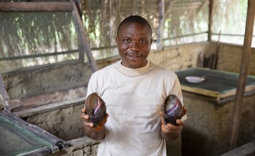 Jerry Gorr at his snail house in Guds Town, Liberia. Photo: Kieran McConville/Concern Worldwide