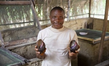 Jerry Gorr at his snail house in Guds Town, Liberia. Photo: Kieran McConville/Concern Worldwide
