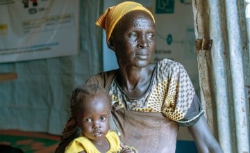 Nyacanya with her grandchild Liakuoth (2) attending Kuach PHCC Nutrition clinic in Guit County, South Sudan. Photo: Eugene Ikua/Concern Worldwide