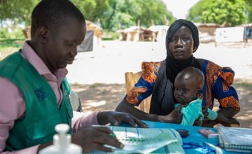 Ayaan and Malual (18 months) at Lueth Ngor PHCU (Public Health Care Unit) in Aweil North. Photo: Eugene Ikua/Concern Worldwide
