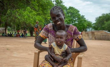 Adut with her daughter Axlam (nine months) at the Lueth Ngor PHCU (Public Health Care Unit) in Aweil North. Photo: Eugene Ikua/Concern Worldwide